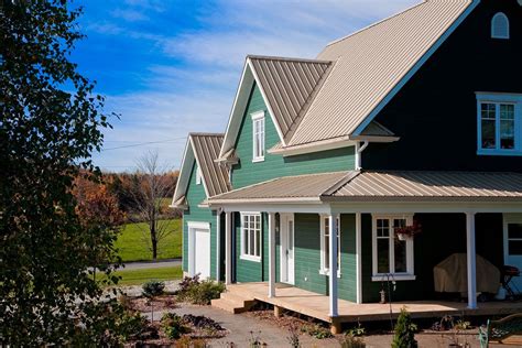 house with metal roof color mocha tan|tan and white house colors.